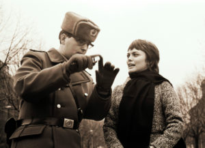 The border guard and the girl - hit star Mireille Mathieu with a border official of the GDR at the Checkpoint Charlie crossing in Berlin's Friedrichstrasse 1970 The border guard and the girl - hit star Mireille Mathieu with a border official of the GDR at the Checkpoint Charlie crossing in Berlin's Friedrichstrasse 1970